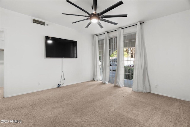 5200 S Lakeshore Dr Unit 120, Tempe, AZ 85283 - unfurnished living room with carpet flooring, ceiling fan, and baseboards