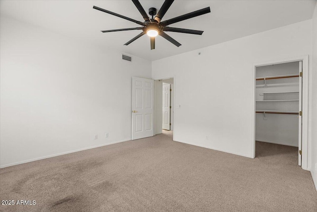 5200 S Lakeshore Dr Unit 120, Tempe, AZ 85283 - unfurnished bedroom with carpet floors, a walk in closet, baseboards, and ceiling fan