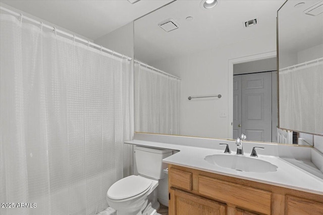 5200 S Lakeshore Dr Unit 120, Tempe, AZ 85283 - bathroom featuring vanity, toilet, and shower / bath combo