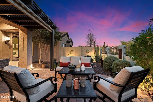 patio terrace at dusk with outdoor lounge area