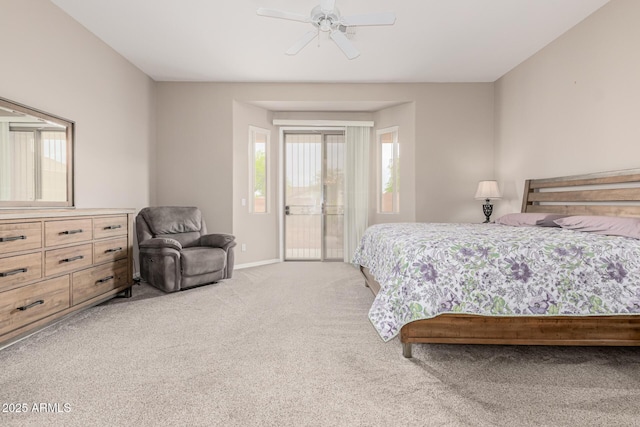 18247 N 168th Cir, Surprise, AZ 85374 - bedroom featuring access to exterior, light carpet, multiple windows, and baseboards