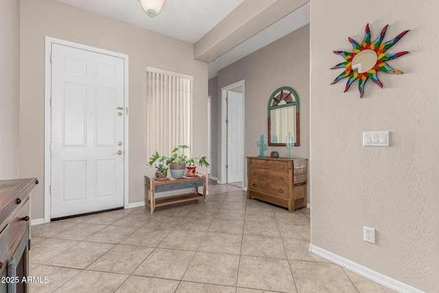 18247 N 168th Cir, Surprise, AZ 85374 - entrance foyer featuring a textured wall, baseboards, and light tile patterned floors