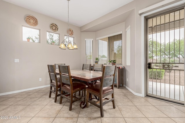 18247 N 168th Cir, Surprise, AZ 85374 - dining room featuring a chandelier, light tile patterned floors, and baseboards