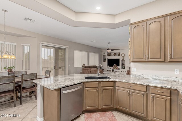 18247 N 168th Cir, Surprise, AZ 85374 - kitchen with dishwasher, a sink, a ceiling fan, a peninsula, and light tile patterned flooring