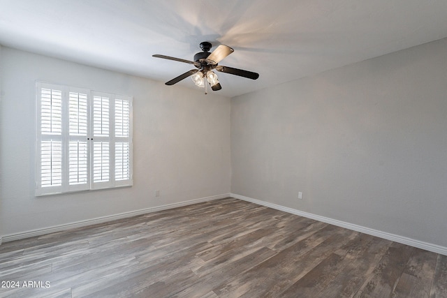 unfurnished room with hardwood / wood-style flooring and ceiling fan