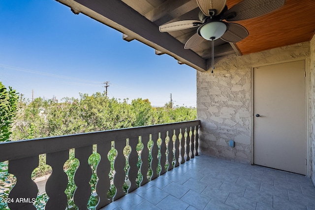 balcony featuring ceiling fan