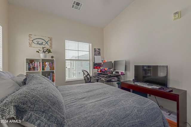 bedroom with vaulted ceiling