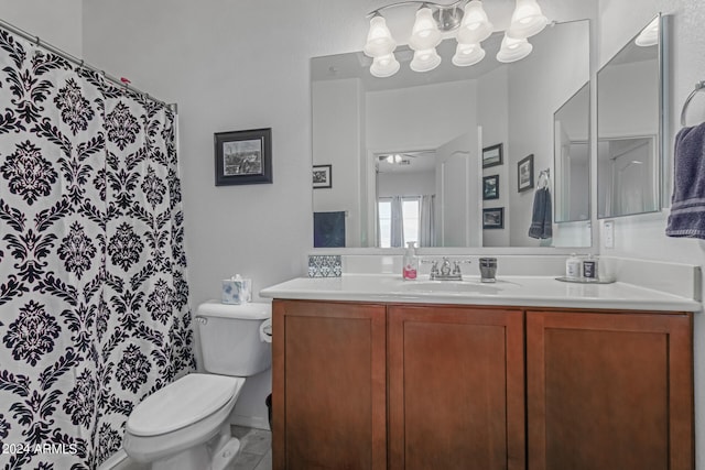 bathroom with ceiling fan, vanity, and toilet