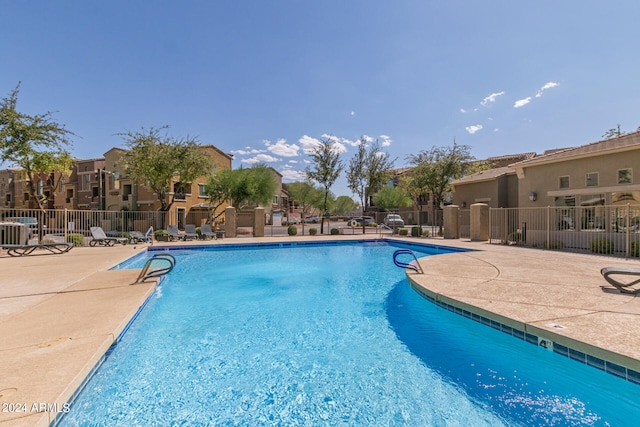 view of pool featuring a patio