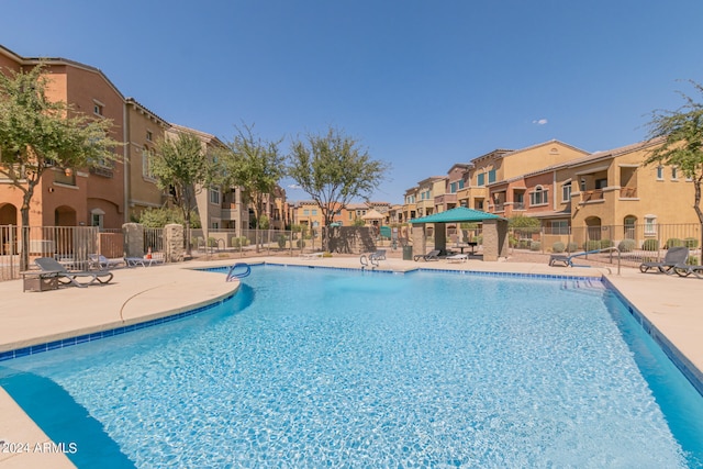 view of pool featuring a patio area