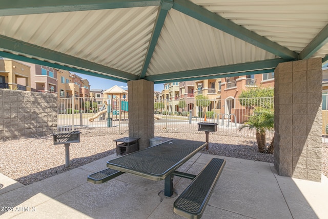 view of patio / terrace with a playground and a gazebo