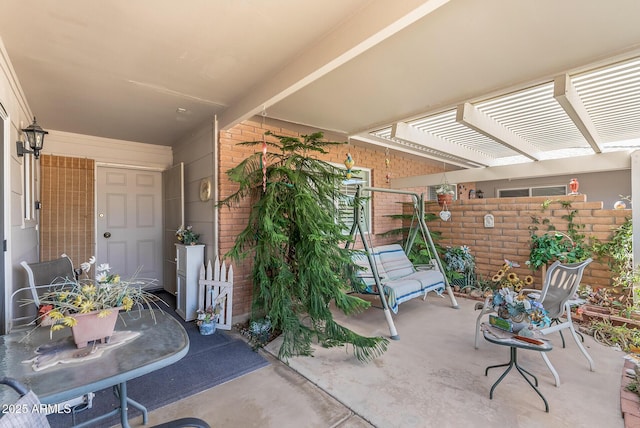view of patio / terrace with fence and a pergola