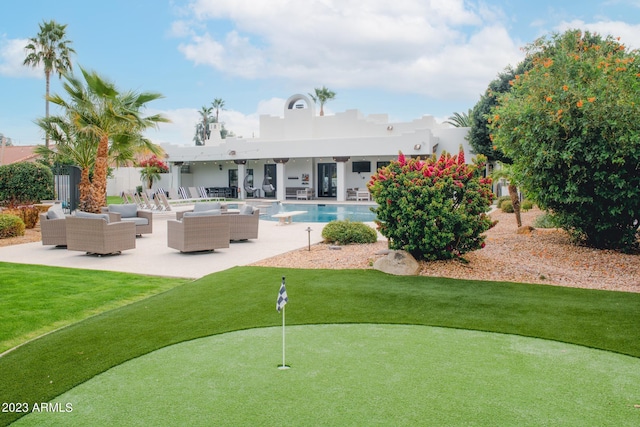 view of property's community featuring a patio, a swimming pool, and an outdoor living space