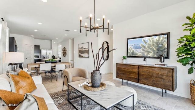 tiled living room with a chandelier