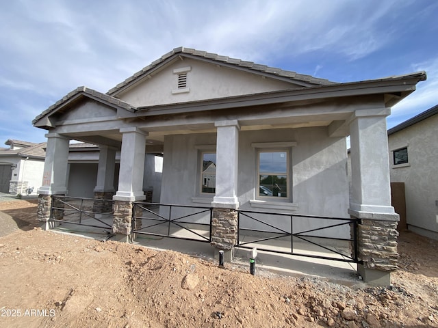1171 E Peach Tree Dr, Chandler, AZ 85249 - view of front facade with stucco siding and covered porch