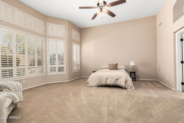 bedroom featuring carpet flooring, visible vents, and baseboards