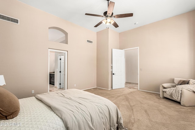 bedroom with carpet flooring, visible vents, baseboards, and ceiling fan