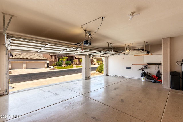 garage featuring a garage door opener