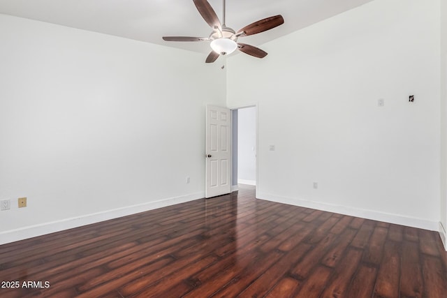 2230 N Los Alamos, Mesa, AZ 85213 - unfurnished room with a ceiling fan, baseboards, dark wood finished floors, and vaulted ceiling