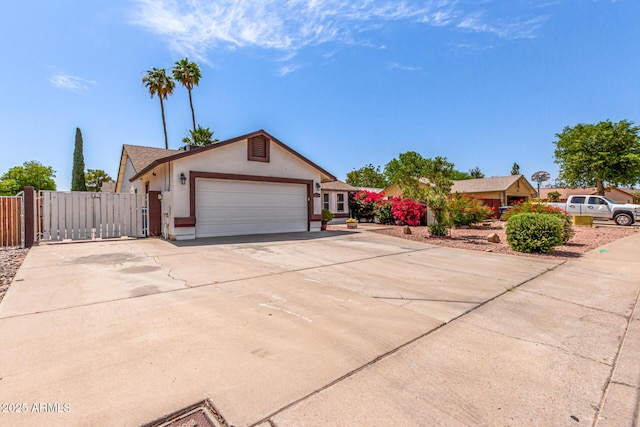 2230 N Los Alamos, Mesa, AZ 85213 - ranch-style home featuring stucco siding, a gate, a garage, and concrete driveway
