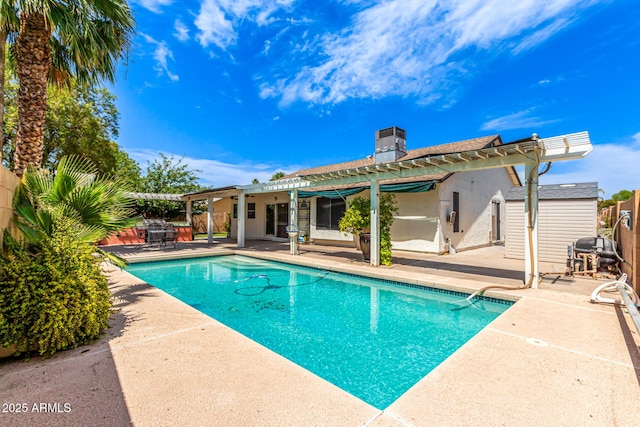 2230 N Los Alamos, Mesa, AZ 85213 - view of swimming pool with a pergola, a patio area, a grill, and an outbuilding