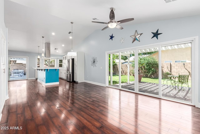 2230 N Los Alamos, Mesa, AZ 85213 - unfurnished living room with plenty of natural light, ceiling fan, dark wood-style flooring, baseboards, and high vaulted ceiling
