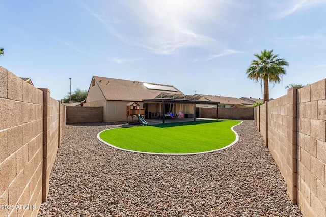 view of yard with a patio area and a fenced backyard