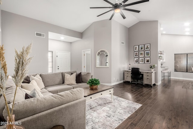 living room with dark wood-style flooring, visible vents, ceiling fan, high vaulted ceiling, and baseboards