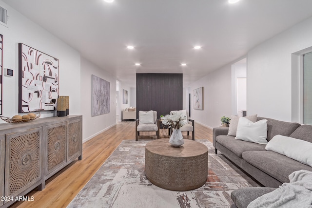 living room with light hardwood / wood-style flooring