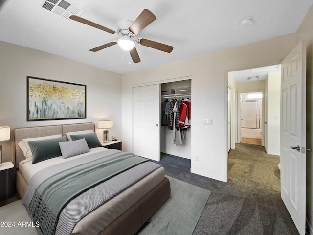 carpeted bedroom with baseboards, visible vents, a closet, and ceiling fan