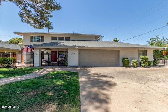 8464 N 7th Ave, Phoenix, AZ 85021 - view of front of home featuring driveway and an attached garage