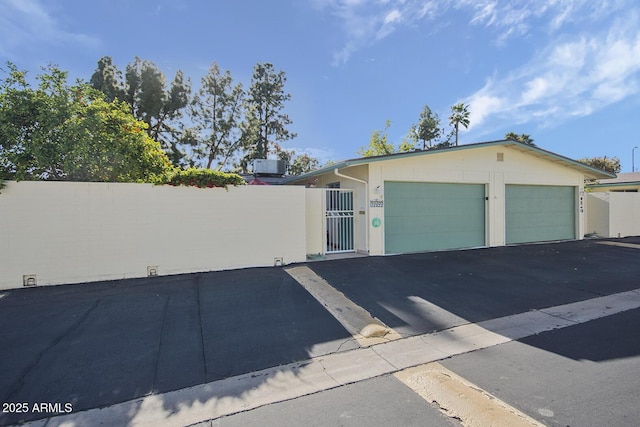 exterior space with a garage