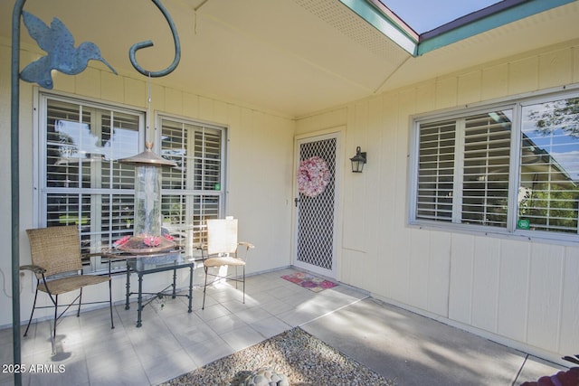 doorway to property featuring a patio area