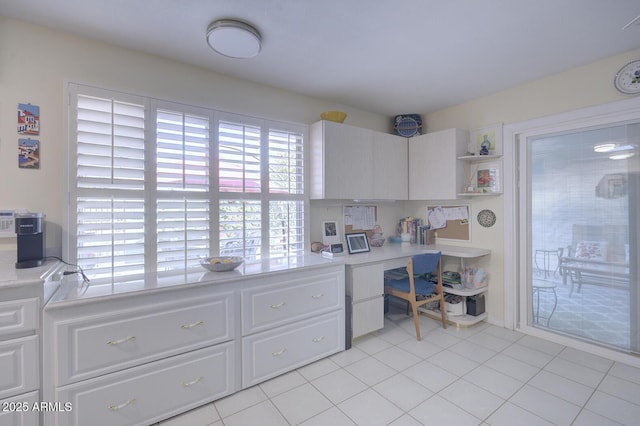 office with light tile patterned floors