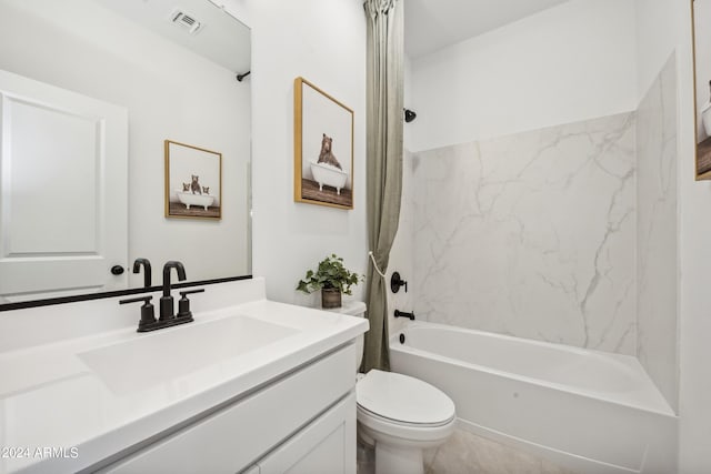 full bathroom featuring shower / bath combo, vanity, and toilet