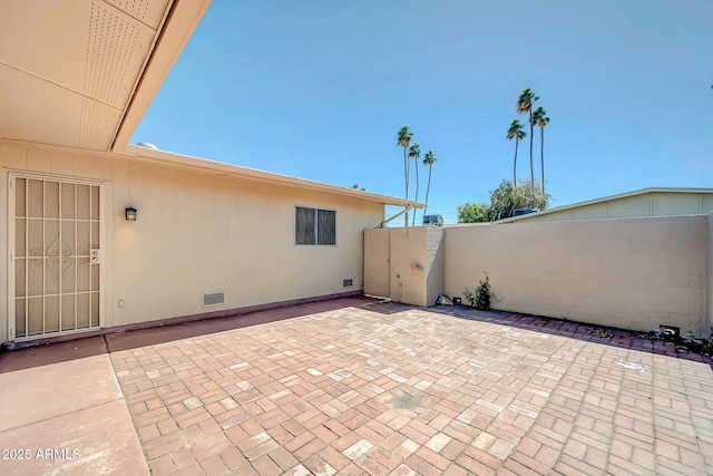 view of patio with fence