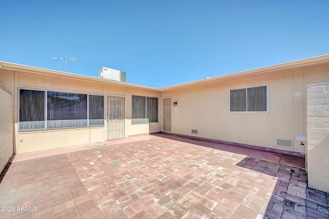 view of patio featuring visible vents and central air condition unit