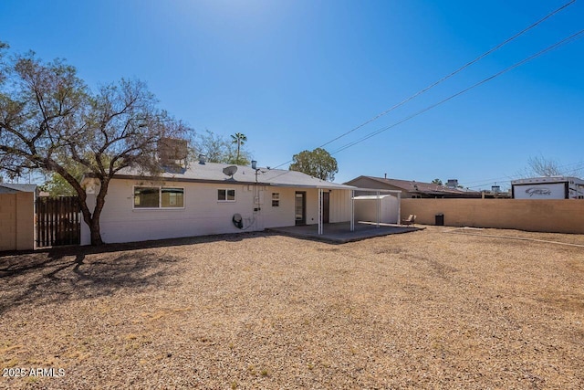 back of property featuring a patio area and fence private yard