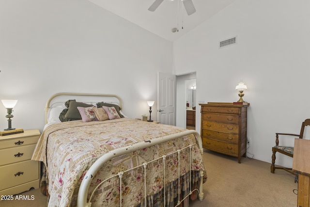 carpeted bedroom featuring high vaulted ceiling and ceiling fan