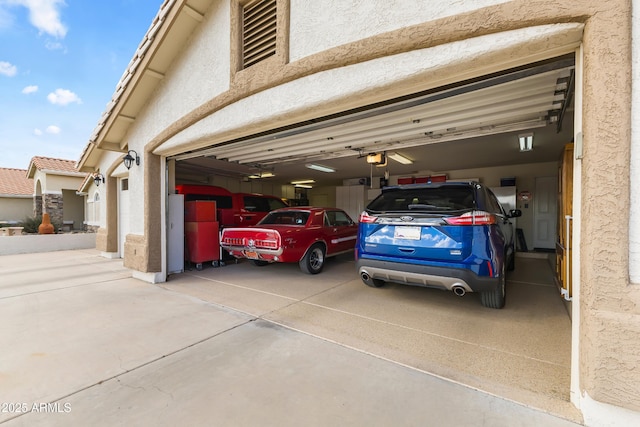 garage featuring a garage door opener