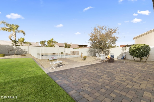 view of patio featuring a fenced in pool