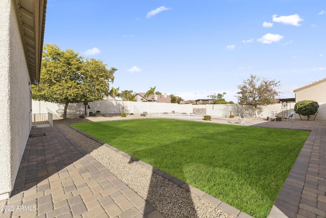 view of yard with a patio area