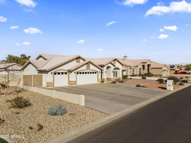 ranch-style home with a garage