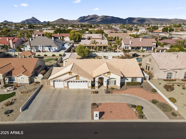 drone / aerial view featuring a mountain view