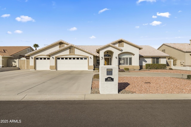 view of front of property with a garage