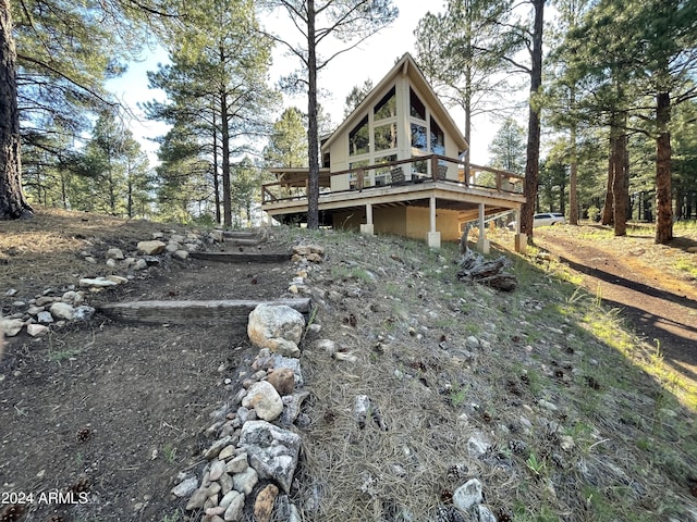 exterior space with a wooden deck