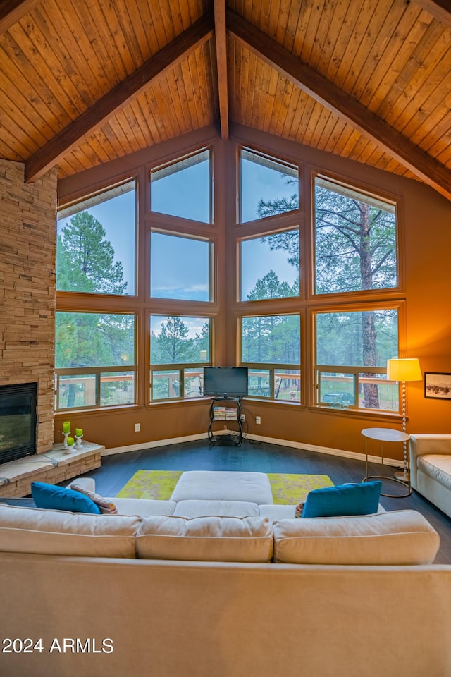 living room featuring a fireplace, high vaulted ceiling, beamed ceiling, and wooden ceiling