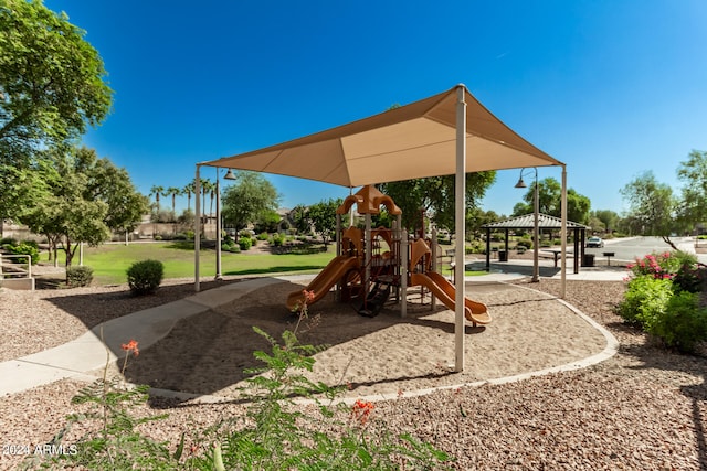 view of jungle gym with a gazebo and a yard