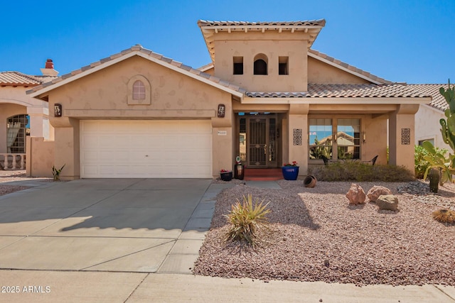 mediterranean / spanish-style home featuring a garage, a tile roof, driveway, and stucco siding