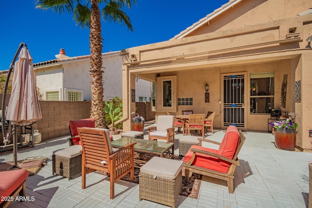 6531 E Star Valley St, Mesa, AZ 85215 - view of patio with outdoor dining area, fence, and an outdoor hangout area